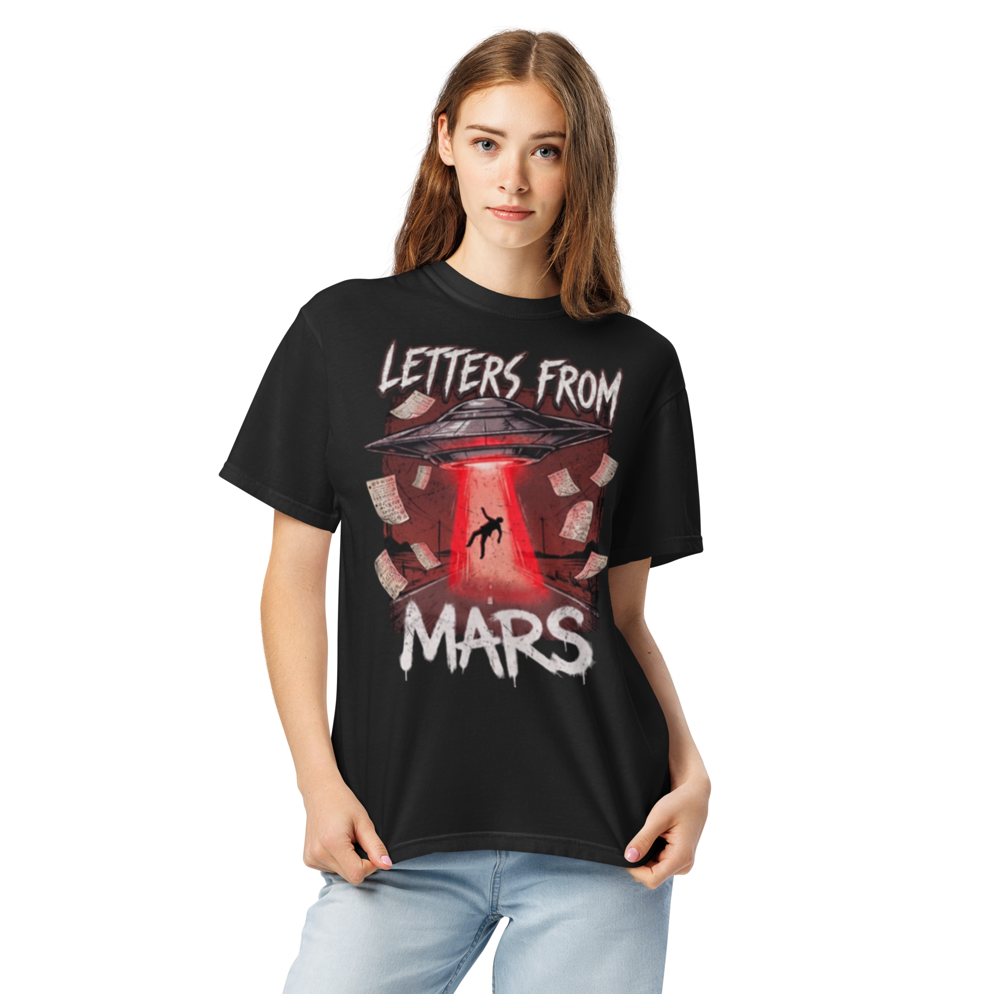 Person wearing a black t-shirt with 'Letters from Mars' graphic design on a white background
