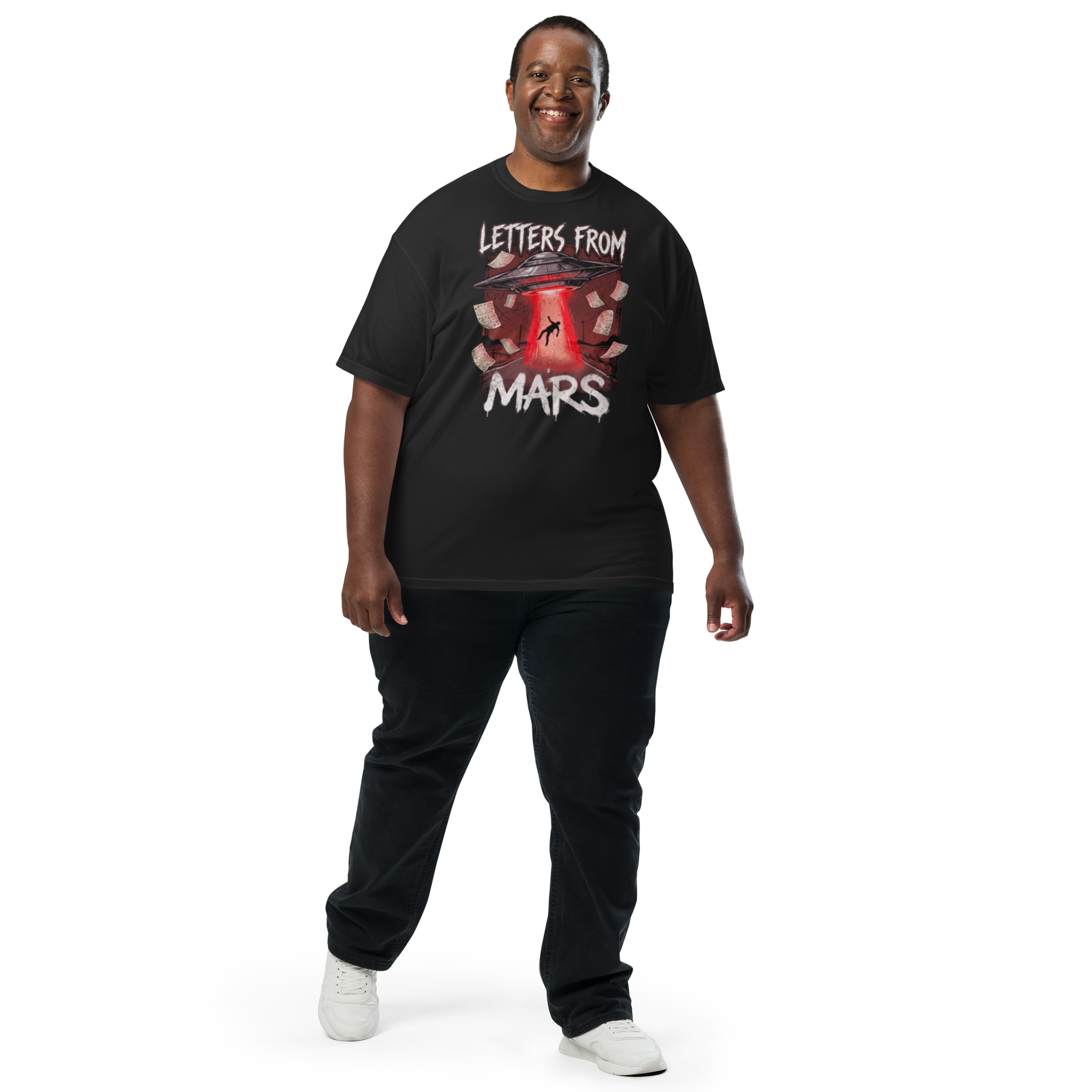 Person wearing a black t-shirt with 'Letters from Mars' design on a white background