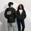Two people wearing black hoodies with a Letters from Mars rose design on the back, standing against a white wall.